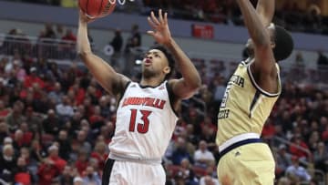 LOUISVILLE, KENTUCKY - JANUARY 22: David Johnson #13 of the Louisville Cardinals shoots the ball against the Georgia Tech Yellow Jackets at KFC YUM! Center on January 22, 2020 in Louisville, Kentucky. (Photo by Andy Lyons/Getty Images)