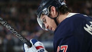 NEW YORK, NY - DECEMBER 03: Ryan McDonagh #27 of the New York Rangers checks to see if his stick broke after a shot in the second period against the Carolina Hurricanes at Madison Square Garden on December 3, 2016 in New York City. The New York Rangers won 4-2. (Photo by Jared Silber/NHLI via Getty Images)