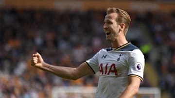 HULL, ENGLAND - MAY 21: Harry Kane of Tottenham Hotspur celebrates after scoring a hat-trick and winning the Premier League Golden Boot award during the Premier League match between Hull City and Tottenham Hotspur at KC Stadium on May 21, 2017 in Hull, England. (Photo by Laurence Griffiths/Getty Images)