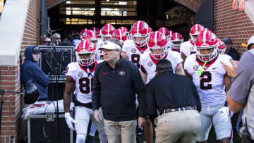 KNOXVILLE, TN - NOVEMBER 18: Head Coach Kirby Smart of the Georgia Bulldogs leads his team on to the field during a game between the University of Georgia and the University of Tennessee at Neyland Stadium on November 18, 2023 in Knoxville, Tennessee. (Photo by Steve Limentani/ISI Photos/Getty Images)