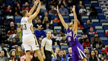 Jan 28, 2016; New Orleans, LA, USA; New Orleans Pelicans forward Ryan Anderson (33) shoots the ball over Sacramento Kings forward Omri Casspi (18) during the first quarter at the Smoothie King Center. Mandatory Credit: Derick E. Hingle-USA TODAY Sports