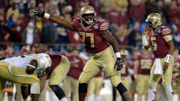 CHARLOTTE, NC - DECEMBER 06: Roderick Johnson #77 of the Florida State Seminoles calls out his blocking assignment against the Georgia Tech Yellow Jackets in the 2nd half during the Atlantic Coast Conference championship game on December 6, 2014 in Greenville, North Carolina. (Photo by Grant Halverson/Getty Images)
