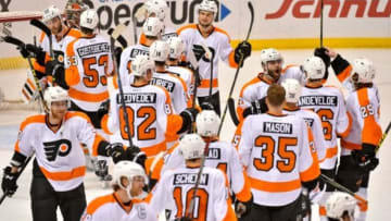 Dec 10, 2015; St. Louis, MO, USA; Philadelphia Flyers celebrate defeating the St. Louis Blues 4-2 at Scottrade Center. Mandatory Credit: Jasen Vinlove-USA TODAY Sports