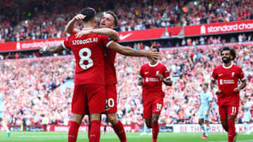 LIVERPOOL, ENGLAND - AUGUST 19: Diogo Jota of Liverpool celebrates scoring a goal to make the score 3-1 with his team-mate Dominik Szoboszlai during the Premier League match between Liverpool FC and AFC Bournemouth at Anfield on August 19, 2023 in Liverpool, England. (Photo by Chris Brunskill/Fantasista/Getty Images)
