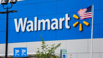 An American flag flies outside of a Walmart Inc. store in Secaucus, New Jersey, U.S., on Wednesday, May 16, 2018. Walmart is scheduled to release earnings figures on May 17. Photographer: Timothy Fadek/Bloomberg via Getty Images