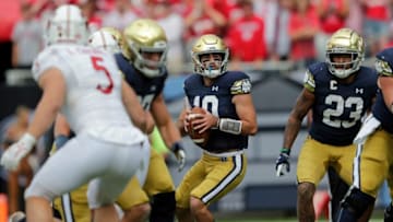 Notre Dame Fighting Irish quarterback Drew Pyne (10) looks to pass against the Wisconsin Badgers during their football game Saturday, September 25, 2021, at Soldier Field in Chicago, Ill. Dan Powers/USA TODAY NETWORK-WisconsinApc Badgersvsnotredame 0925212128djp