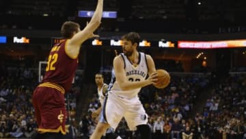 Mar 1, 2014; Memphis, TN, USA; Cleveland Cavaliers center Spencer Hawes (32) guards Memphis Grizzlies center Marc Gasol (33) during the first quarter at FedExForum. Mandatory Credit: Justin Ford-USA TODAY Sports