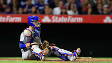 ANAHEIM, CA - JUNE 29: Yasmani Grandal #9 of the Los Angeles Dodgers sits on the ground after Cameron Maybin #9 of the Los Angeles Angels of Anaheim scored on a play at the plate during the fourth inning of a game at Angel Stadium of Anaheim on June 29, 2017 in Anaheim, California. (Photo by Sean M. Haffey/Getty Images)