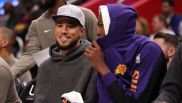 DETROIT, MICHIGAN - NOVEMBER 05: Devin Booker #1 of the Phoenix Suns talks with teammate Kevin Durant #35 while playing the Detroit Pistonsat Little Caesars Arena on November 05, 2023 in Detroit, Michigan. NOTE TO USER: User expressly acknowledges and agrees that, by downloading and or using this photograph, User is consenting to the terms and conditions of the Getty Images License Agreement. (Photo by Gregory Shamus/Getty Images)