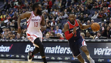 Nov 7, 2016; Washington, DC, USA; Washington Wizards guard John Wall (2) dribbles the ball as Houston Rockets guard James Harden (13) chases in the third quarter at Verizon Center. The Rockets won 114-106. Mandatory Credit: Geoff Burke-USA TODAY Sports
