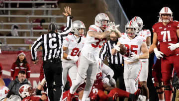 Oct 28, 2023; Madison, Wisconsin, USA; Ohio State Buckeyes defensive end Jack Sawyer (33) celebrates a goal line stand during the first half of the NCAA football game against the Wisconsin Badgers at Camp Randall Stadium.