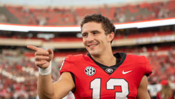 ATHENS, GA - OCTOBER 15: Stetson Bennett #13 of the Georgia Bulldogs points after the game against the Vanderbilt Commodores at Sanford Stadium on October 15, 2022 in Athens, Georgia. (Photo by Adam Hagy/Getty Images)