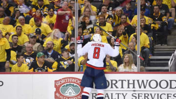 PITTSBURGH, PA - MAY 01: Washington Capitals Left Wing Alex Ovechkin (8) jumps into the glass after scoring the game winning goal during the third period. The Washington Capitals defeated the Pittsburgh Penguins 4-3 in Game Three of the Eastern Conference Second Round during the 2018 NHL Stanley Cup Playoffs on May 1, 2018, at PPG Paints Arena in Pittsburgh, PA. (Photo by Jeanine Leech/Icon Sportswire via Getty Images)