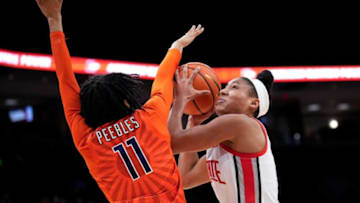 Jan 8, 2023; Columbus, Ohio, USA; Ohio State Buckeyes forward Taylor Thierry (2) makes a shot attempt while defended by Illinois Fighting Illini guard Jada Peebles (11) during the first quarter of the women’s NCAA division I basketball game between the Ohio State Buckeyes and the Illinois Fighting Illini at Value City Arena on Sunday afternoon.Basketball Ceb Wbk Illinois Illinois At Ohio State