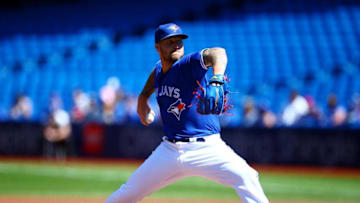 Sean Reid-Foley #54 of the Toronto Blue Jays delivers a pitch in the first inning during an MLB game. (Photo by Vaughn Ridley/Getty Images)