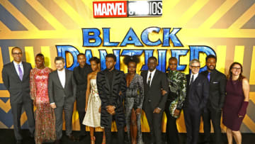 LONDON, ENGLAND - FEBRUARY 08: (L-R) Nate Moore, Florence Kasumba, Andy Serkis, Martin Freeman, Michael B. Jordan, Letitia Wright, Chadwick Boseman, Lupita Nyong'o, Daniel Kaluuya, Danai Gurira, Ryan Coogler and Victoria Alonso attend the European Premiere of 'Black Panther' at the Eventim Apollo on February 8, 2018 in London, England. (Photo by David M. Benett/Dave Benett/WireImage)