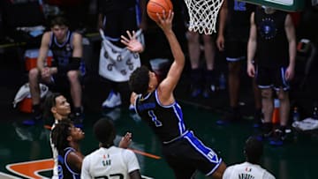 Feb 1, 2021; Coral Gables, Florida, USA; Duke Blue Devils forward Jalen Johnson (1) shoots the ball against the Miami Hurricanes during the second half at Watsco Center. Mandatory Credit: Jasen Vinlove-USA TODAY Sports