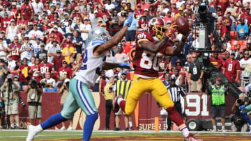 Sep 18, 2016; Landover, MD, USA; Washington Redskins wide receiver Jamison Crowder (80) catches a touchdown pass as Dallas Cowboys cornerback Orlando Scandrick (32) defends in the third quarter at FedEx Field. The Cowboys won 27-23. Mandatory Credit: Geoff Burke-USA TODAY Sports