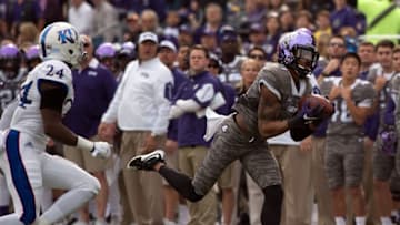 Nov 14, 2015; Fort Worth, TX, USA; TCU Horned Frogs wide receiver Kolby Listenbee (7) catches a pass for a first down against the Kansas Jayhawks during the first quarter at Amon G. Carter Stadium. Mandatory Credit: Jerome Miron-USA TODAY Sports