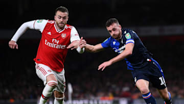 LONDON, ENGLAND - SEPTEMBER 24: Calum Chambers of Arsenal battles for the ball with Jack Robinson of Nottingham Forest during the Carabao Cup Third Round match between Arsenal FC and Nottingham Forrest at Emirates Stadium on September 24, 2019 in London, England. (Photo by Laurence Griffiths/Getty Images)