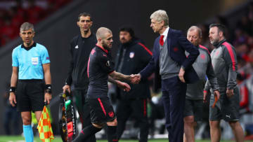 MADRID, SPAIN - MAY 03: Jack Wilshere of Arsenal shakes hands with Arsene Wenger, Manager of Arsenal as he is substituted during the UEFA Europa League Semi Final second leg match between Atletico Madrid and Arsenal FC at Estadio Wanda Metropolitano on May 3, 2018 in Madrid, Spain. (Photo by Catherine Ivill/Getty Images)