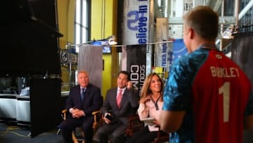 Feb 22, 2013; Indianapolis, IN, USA; Southern California quarterback Matt Barkley steps onto a tv set and talks with Chirs Mortensen and Adam Schefter during the 2013 NFL Combine at Lucas Oil Stadium. Mandatory Credit: Brian Spurlock-USA TODAY Sports