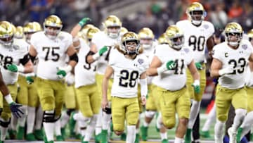 ARLINGTON, TEXAS - DECEMBER 29: Nicco Fertitta #28 of the Notre Dame Fighting Irish takes the field with teammates before the game against the Clemson Tigers during the College Football Playoff Semifinal Goodyear Cotton Bowl Classic at AT&T Stadium on December 29, 2018 in Arlington, Texas. (Photo by Ronald Martinez/Getty Images)