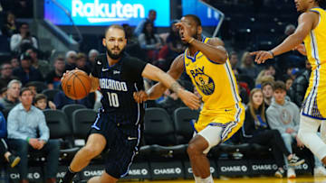 SAN FRANCISCO, CALIFORNIA - JANUARY 18: Evan Fournier #10 of the Orlando Magic drives to the basket against Alec Burks #8 of the Golden State Warriors during the first half at the Chase Center on January 18, 2020 in San Francisco, California. NOTE TO USER: User expressly acknowledges and agrees that, by downloading and/or using this photograph, user is consenting to the terms and conditions of the Getty Images License Agreement. (Photo by Daniel Shirey/Getty Images)