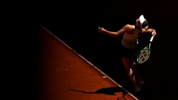 MADRID, SPAIN - MAY 09: Belinda Bencic of Switzerland serves in her match against Naomi Osaka of Japan during day six of the Mutua Madrid Open at La Caja Magica on May 09, 2019 in Madrid, Spain. (Photo by Alex Pantling/Getty Images)