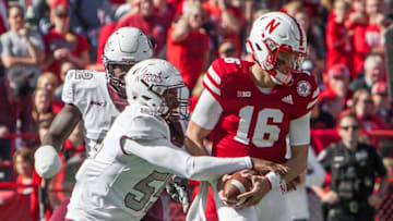 LINCOLN, NE - OCTOBER 27: Bethune Cookman Wildcats defensive lineman Todney Evans (55) nearly strips the ball away from Nebraska Cornhuskers quarterback Noah Vedral (16) during the game between the Bethune-Cookman Wildcats and the Nebraska Cornhuskers on Saturday October 27, 2018 at Memorial Stadium in Lincoln, Nebraska. (Photo by Nick Tre. Smith/Icon Sportswire via Getty Images)