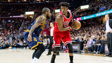CLEVELAND, OH - FEBRUARY 25: Kyrie Irving #2 of the Cleveland Cavaliers puts pressure on Jimmy Butler #21 of the Chicago Bulls during the second half at Quicken Loans Arena on February 25, 2017 in Cleveland, Ohio. The Bulls defeated the Cavaliers 117-99. NOTE TO USER: User expressly acknowledges and agrees that, by downloading and/or using this photograph, user is consenting to the terms and conditions of the Getty Images License Agreement. (Photo by Jason Miller/Getty Images)