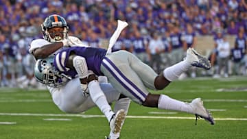 MANHATTAN, KS - SEPTEMBER 15: Defensive back Darreyl Patterson #18 of the Kansas State Wildcats tackles wide receiver Tariq Woolen #3 of the UTSA Roadrunners during the second half on September 15, 2018 at Bill Snyder Family Stadium in Manhattan, Kansas. (Photo by Peter G. Aiken/Getty Images)