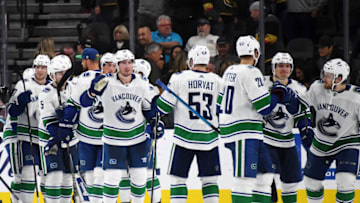 LAS VEGAS, NEVADA - OCTOBER 24: The Vancouver Canucks celebrate after their 3-2 shootout victory over the Vegas Golden Knights at T-Mobile Arena on October 24, 2018 in Las Vegas, Nevada. (Photo by Ethan Miller/Getty Images)