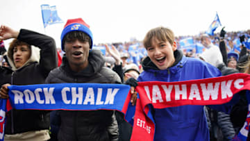 LAWRENCE, KANSAS - OCTOBER 28: Fans of the Kansas Jayhawks cheer after a touchdown during the first half against the Oklahoma Sooners at David Booth Kansas Memorial Stadium on October 28, 2023 in Lawrence, Kansas. (Photo by Jay Biggerstaff/Getty Images)