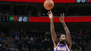 SALT LAKE CITY, UT - OCTOBER 6: Troy Daniels #30 of the Phoenix Suns shoots the ball against the Utah Jazz on October 6, 2017 at vivint.SmartHome Arena in Salt Lake City, Utah. NOTE TO USER: User expressly acknowledges and agrees that, by downloading and or using this Photograph, User is consenting to the terms and conditions of the Getty Images License Agreement. Mandatory Copyright Notice: Copyright 2017 NBAE (Photo by Melissa Majchrzak/NBAE via Getty Images)