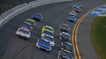 DAYTONA BEACH, FL - JULY 07: Ty Dillon, driver of the #13 GEICO Military Chevrolet, leads a pack of cars during the Monster Energy NASCAR Cup Series Coke Zero Sugar 400 at Daytona International Speedway on July 7, 2018 in Daytona Beach, Florida. (Photo by Sarah Crabill/Getty Images)