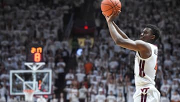 Feb 1, 2020; Blacksburg, Virginia, USA; Virginia Tech Hokies guard Nahiem Alleyne (4) attempts a three point basket against the Florida State Seminoles in the second half at Cassell Coliseum. Mandatory Credit: Michael Thomas Shroyer-USA TODAY Sports
