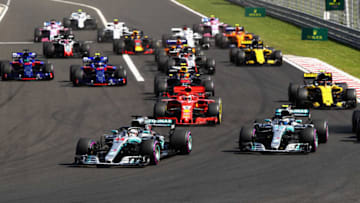 BUDAPEST, HUNGARY - JULY 29: Lewis Hamilton of Great Britain driving the (44) Mercedes AMG Petronas F1 Team Mercedes WO9 and Valtteri Bottas driving the (77) Mercedes AMG Petronas F1 Team Mercedes WO9 (Photo by Mark Thompson/Getty Images)
