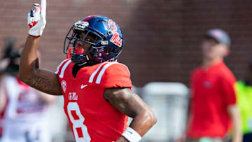 OXFORD, MS - SEPTEMBER 8: Elijah Moore #8 of the Mississippi Rebels celebrates after scoring a touchdown against the Southern Illinois Salukis during the first half at Vaught-Hemingway Stadium on September 8, 2018 in Oxford, Mississippi. (Photo by Wesley Hitt/Getty Images)