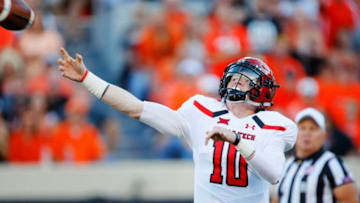 STILLWATER, OK - SEPTEMBER 22: Quarterback Alan Bowman #10 of the Texas Tech Red Raiders launches a pass against the Oklahoma State Cowboys in the first quarter on September 22, 2018 at Boone Pickens Stadium in Stillwater, Oklahoma. The Red Raiders won 41-17. (Photo by Brian Bahr/Getty Images)