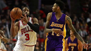 CHICAGO, IL - NOVEMBER 30: Dwyane Wade #3 of the Chicago Bulls passses next to Brandon Ingram #14 of the Los Angeles Lakers at the United Center on November 30, 2016 in Chicago, Illinois. The Lakers defeated the Bulls 96-90. (Photo by Jonathan Daniel/Getty Images)