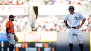 NEW YORK, NY - MAY 30: Aaron Judge #99 of the New York Yankees and Jose Altuve #27 of the Houston Astros look on during the game at Yankee Stadium on Wednesday May 30, 2018 in the Bronx borough of New York City. (Photo by Rob Tringali/SportsChrome/Getty Images)