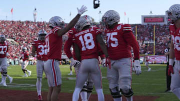 Sat., Jan. 1, 2022; Pasadena, California, USA; Teammates celebrate with Ohio State Buckeyes wide receiver Marvin Harrison Jr. (18) after he scored a touchdown during the second quarter of the 108th Rose Bowl Game between the Ohio State Buckeyes and the Utah Utes at the Rose Bowl.Rose Bowl Game Ohio State Buckeyes Against Utah Utes