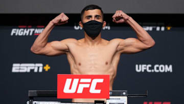 LAS VEGAS, NEVADA - AUGUST 20: In this UFC handout, Saidyokub Kakhramonov of Uzbekistan poses on the scale during the UFC Fight Night weigh-in at UFC APEX on August 20, 2021 in Las Vegas, Nevada. (Photo by Chris Unger/Zuffa LLC via Getty Images)
