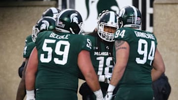 EAST LANSING, MI - NOVEMBER 04: Felton Davis III #18 of the Michigan State Spartans celebrates his second half touchdown with teammates while playing the Penn State Nittany Lions at Spartan Stadium on November 4, 2017 in East Lansing, Michigan. (Photo by Gregory Shamus/Getty Images)