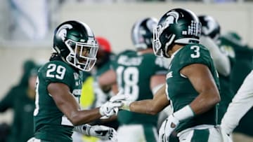 Shakur Brown and Xavier Henderson, Michigan State football (Photo by Duane Burleson/Getty Images)