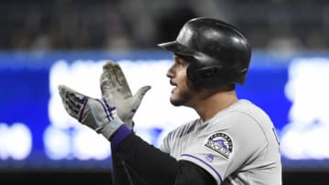 SAN DIEGO, CA - MAY 14: Nolan Arenado #28 of the Colorado Rockies claps after hitting an RBI single during the third inning of a baseball game against the San Diego Padres at PETCO Park on May 14, 2018 in San Diego, California. (Photo by Denis Poroy/Getty Images)