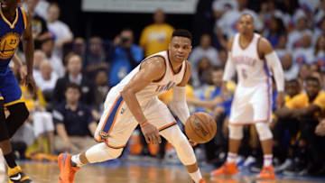 May 24, 2016; Oklahoma City, OK, USA; Oklahoma City Thunder guard Russell Westbrook (0) handles the ball against the Golden State Warriors during the third quarter in game four of the Western conference finals of the NBA Playoffs at Chesapeake Energy Arena. Mandatory Credit: Mark D. Smith-USA TODAY Sports