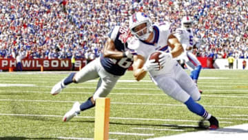 Sep 20, 2015; Orchard Park, NY, USA; Buffalo Bills wide receiver Chris Hogan (15) is tackled shop of the goal line by New England Patriots cornerback Logan Ryan (26) during the first quarter at Ralph Wilson Stadium. Mandatory Credit: Kevin Hoffman-USA TODAY Sports