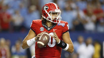 Sep 3, 2016; Atlanta, GA, USA; Georgia Bulldogs quarterback Jacob Eason (10) throws against the North Carolina Tar Heels during the third quarter of the 2016 Chick-Fil-A Kickoff game at Georgia Dome. Mandatory Credit: Brett Davis-USA TODAY Sports